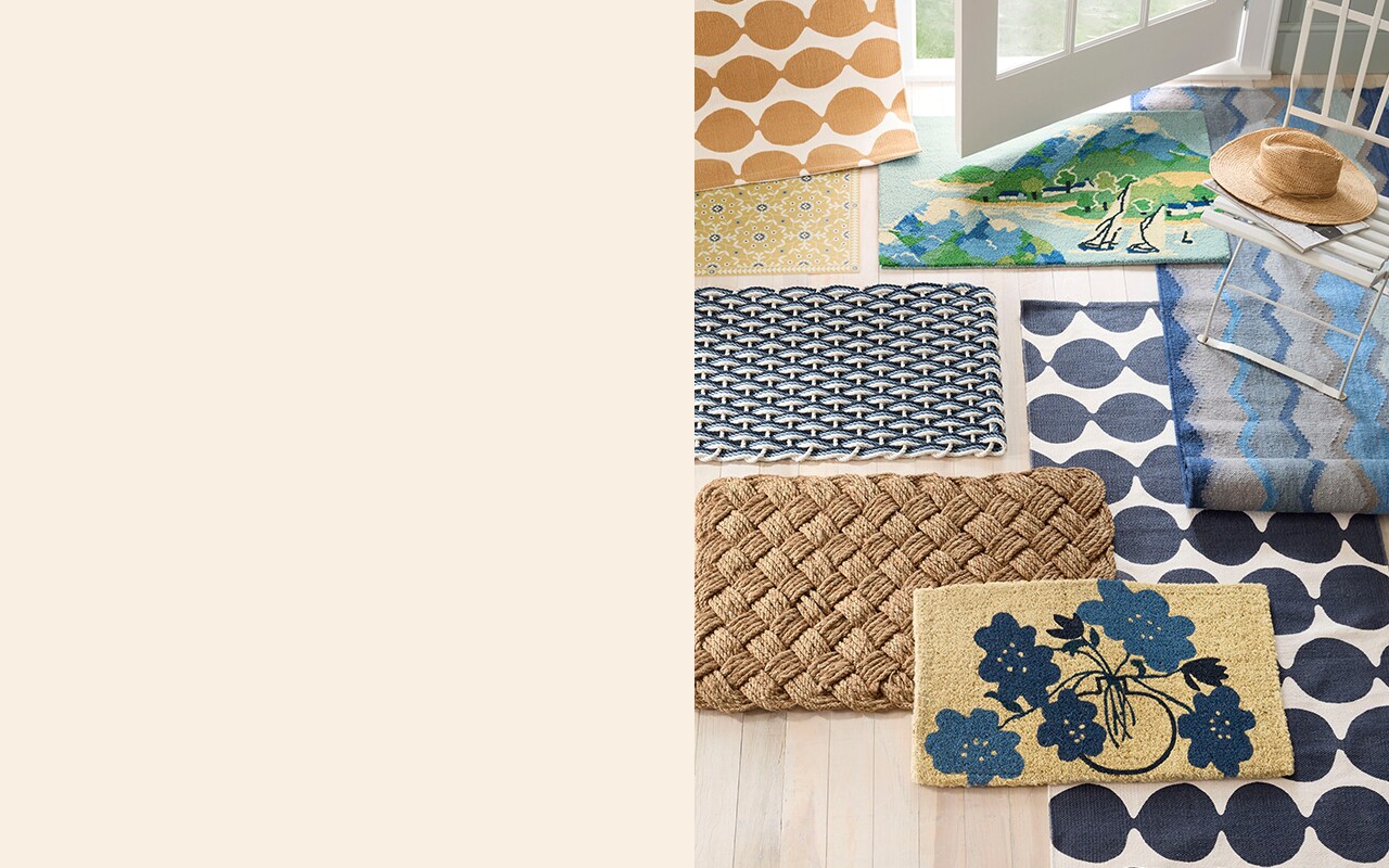 A collection of rugs & doormats in various seasonal patterns.  Shop rugs & doormats.